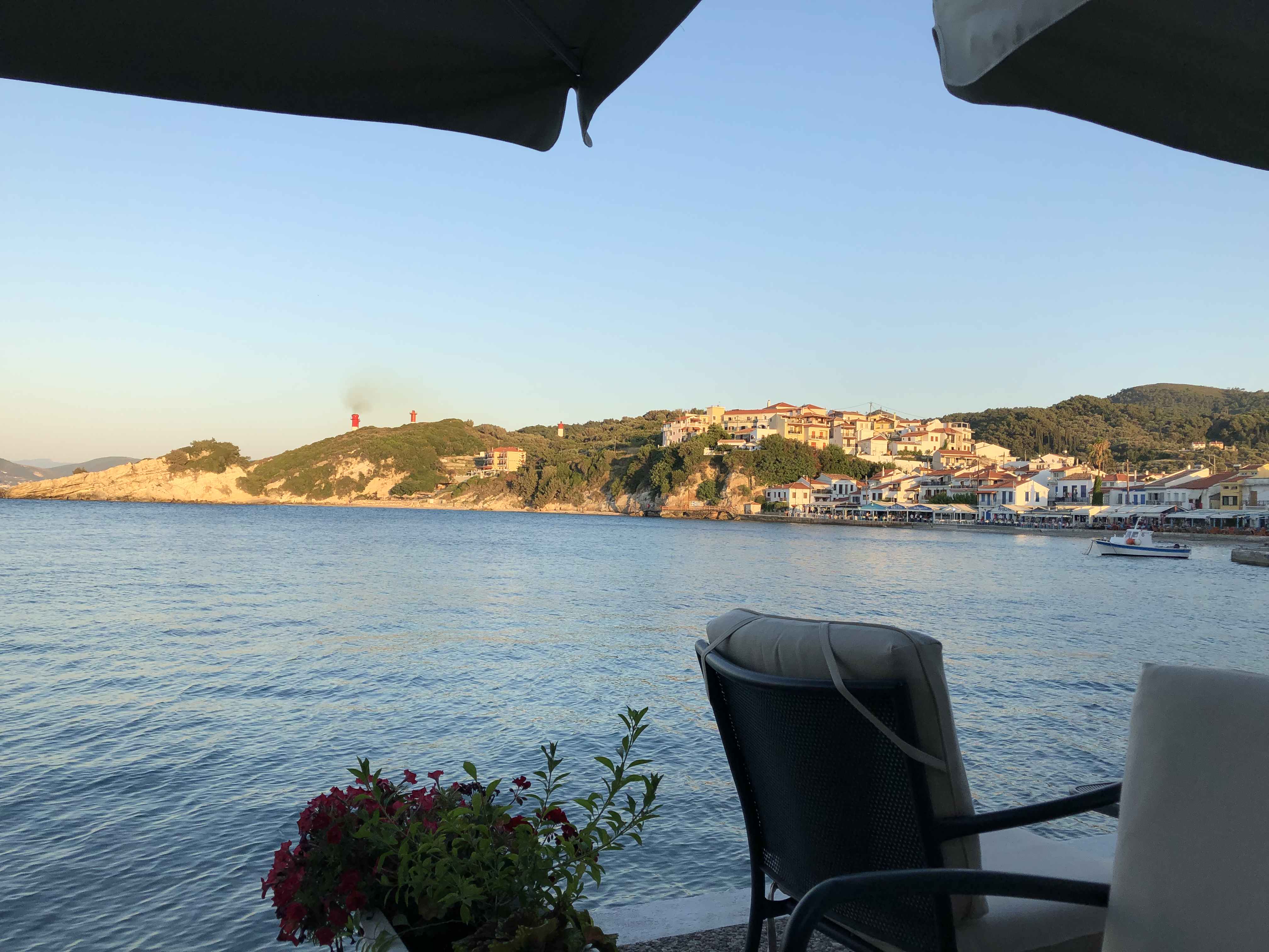 Some chairs by the sea.